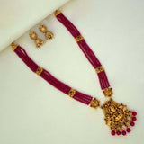Antique Gold Lakshmi Pendant Beaded Long Necklace Set with jhumka earrings in vibrant colors.