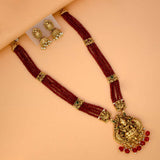 Antique Gold Lakshmi Pendant Beaded Long Necklace Set with red beads and jhumka earrings.