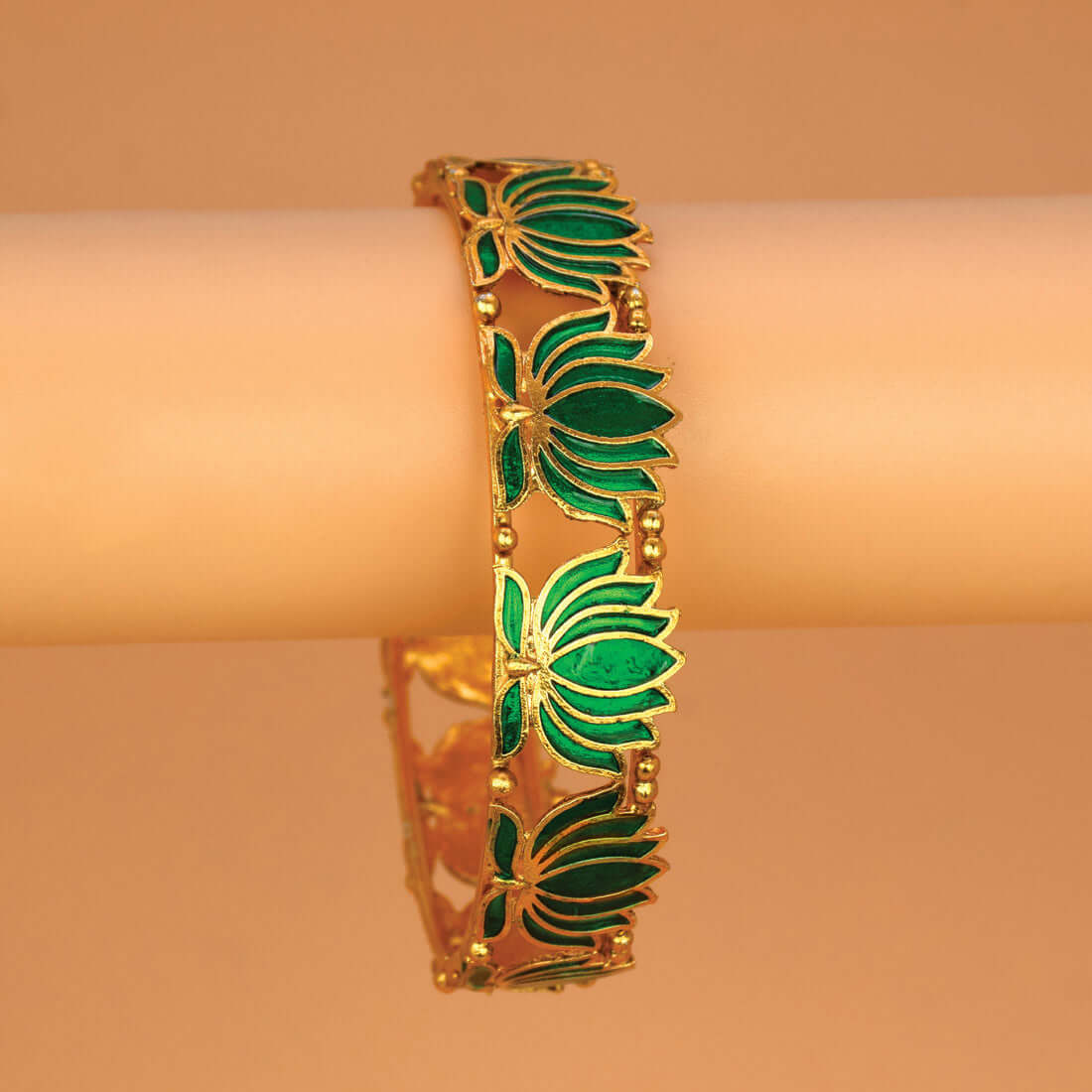Matte Gold Plated Lotus Enamel Bangle with intricate green lotus motifs and rich enamel detailing.