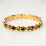 Antique Heart Floral Kemp Stone Victorian Bangle showcasing intricate floral designs and colorful stones.