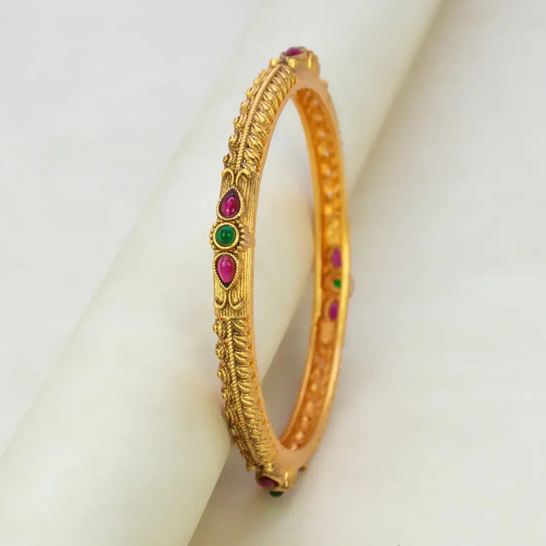 Antique Matte Kemp Multi Colour Stone Bangle featuring intricate design and vibrant ruby and emerald stones.