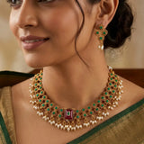 Antique White Pearls Hanging Stone Necklace Set worn by a model with matching earrings and elegant outfit.