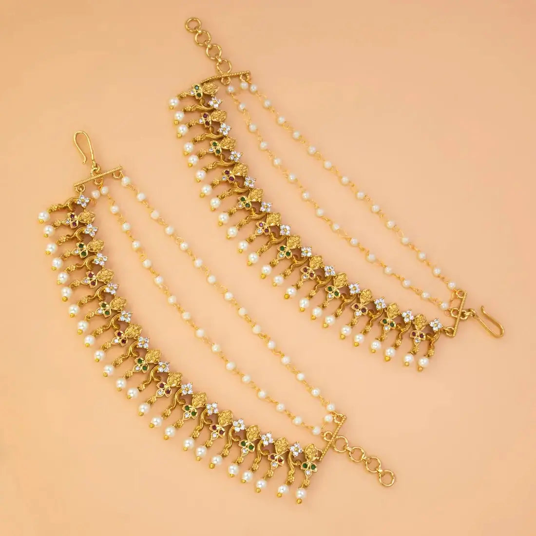 Floral Gold Plated Ruby Emerald CZ Pearl Ear Chain showcasing intricate gold motifs and cascading pearl layers.
