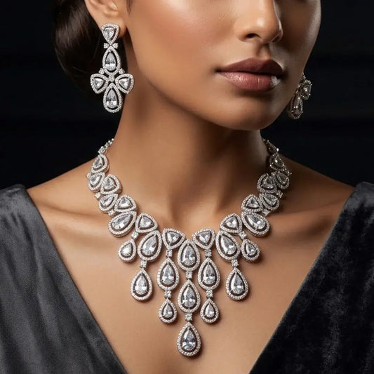 Rhodium-Plated CZ Stone Bridal Necklace Set worn with matching earrings on model's neck and ears.