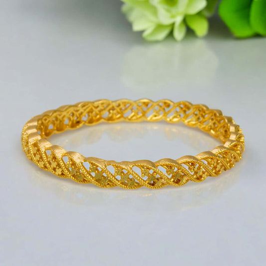 Plain Gold Plated Designer Bangle showcasing intricate twisted patterns, perfect for elevating any outfit.