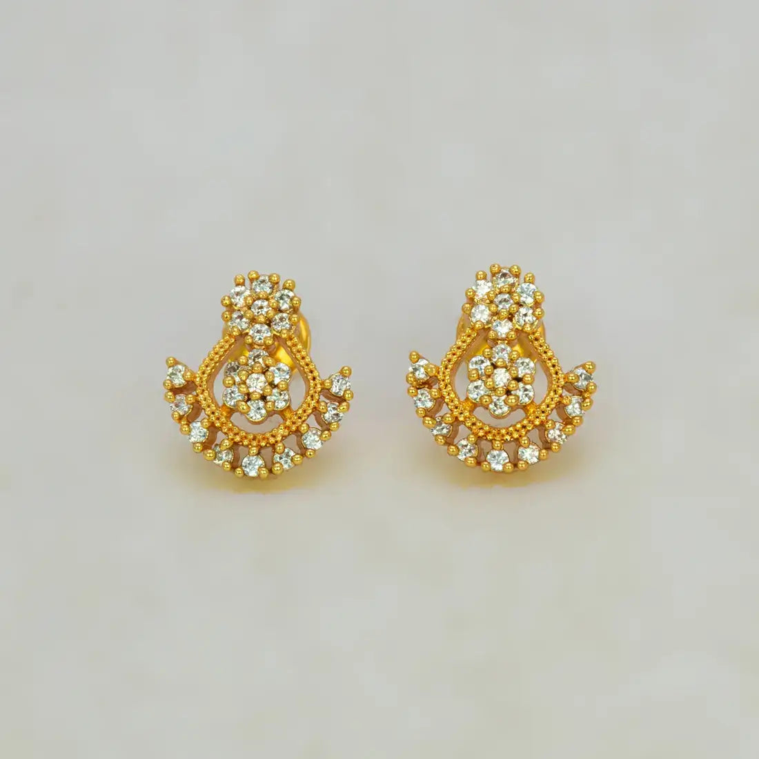 Dual Floral Design Gold Plated CZ Stone Stud Earrings featuring intricate gold plating and sparkling cubic zirconia.