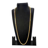 Elegant Designer Gold Plated Chain -10 P displayed on a black jewelry stand, showcasing its stunning shine.