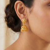 Gold-Plated Small Floral Jhumka earrings showcased on a woman, highlighting traditional Indian craftsmanship.