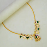 South Indian Green Palakka Lakshmi Kasu Necklace with embossed coins and green pendants.