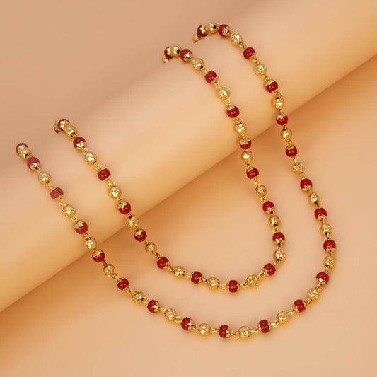 South Indian Coral Red and Golden Beaded Chain with alternating textured gold-plated and coral red beads.