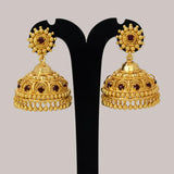 Red Stone Gold Plated Big Jhumka Earrings featuring golden arch mounts and deep red stones.