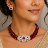Elegant Multi-Strand Crystal American Diamond Choker Set worn with matching earrings, featuring maroon crystals.