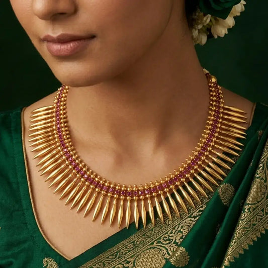 Gold Plated Jasmine Bud Ruby Stone Necklace worn by a model in traditional attire.