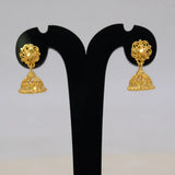 Simple Gold Foamed Jhumka Earrings displayed on a black earring stand, showcasing intricate filigree design.