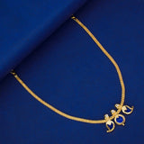 Simple Three Petal Gold Plated Mango Necklace with blue mango CZ stones and round pendant on a blue background.