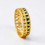 South Indian One Gram Gold Broad Mango Bangle featuring green and ruby accents on a gold base.