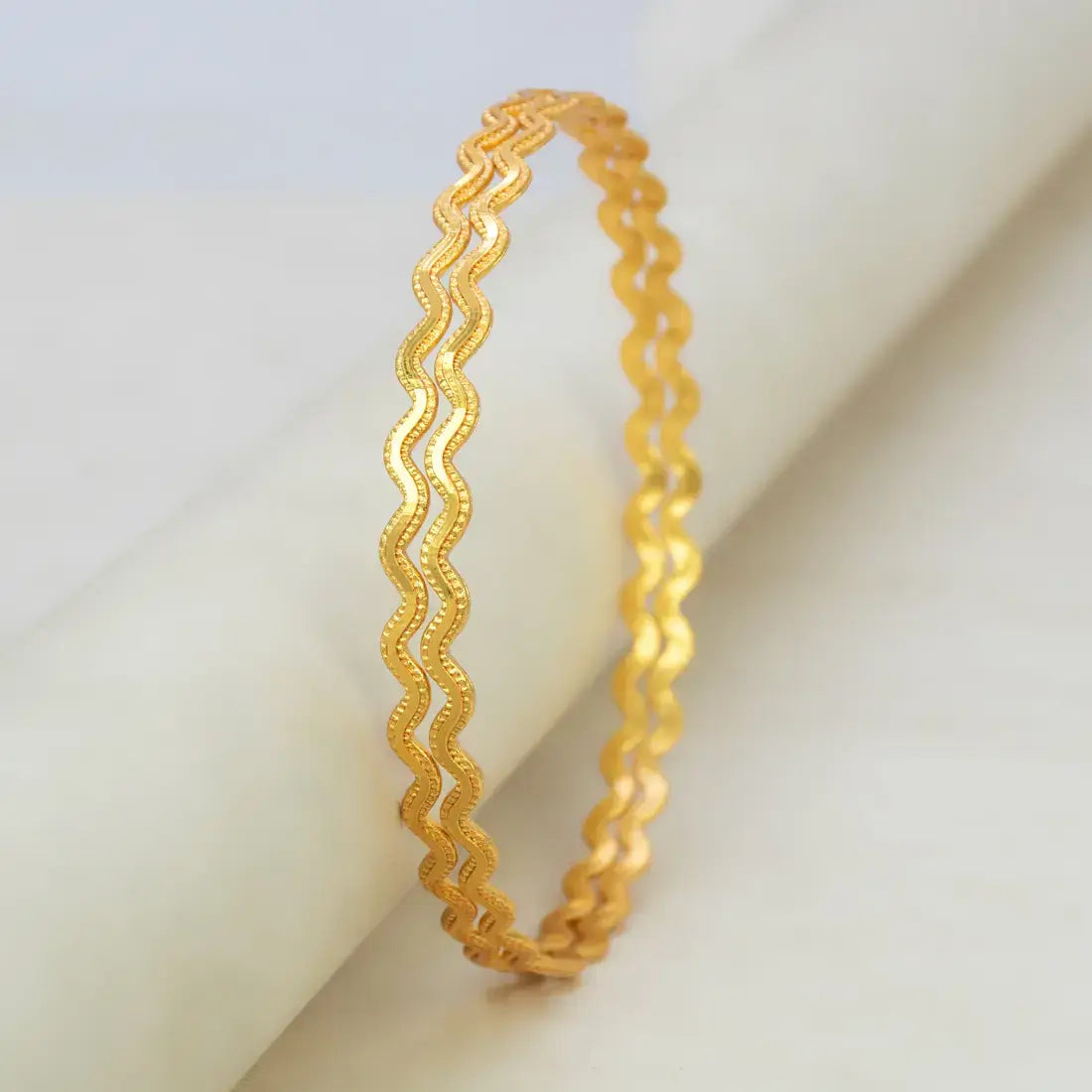 Unique Gold Plated Zigzag Bangles featuring a continuous zigzag wave design with micro-bead texture for added sparkle.