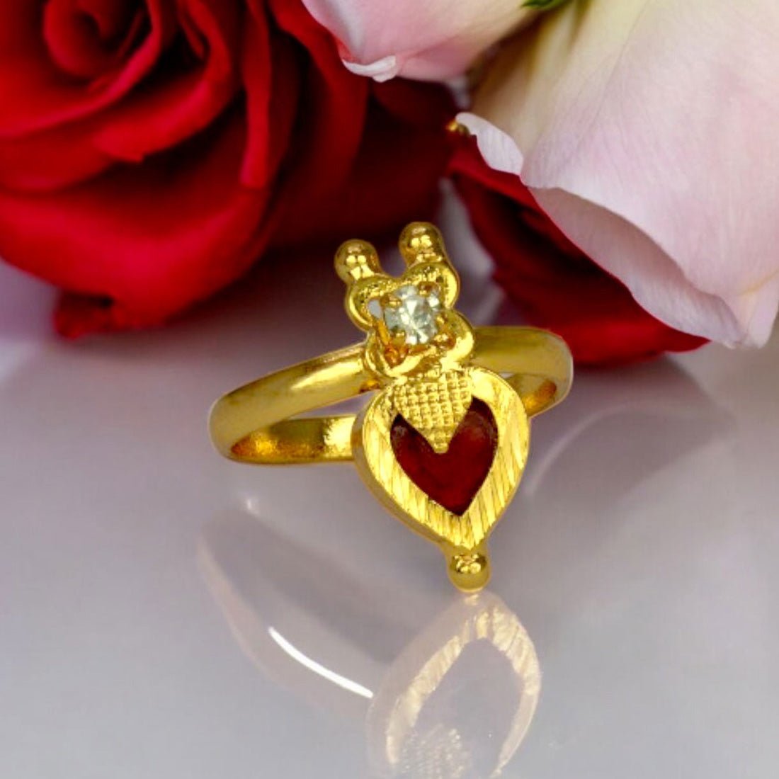 Ethnic Gold Plated Heart Enamel Finger Ring featuring a red heart design with gold accents, perfect fashion accessory.