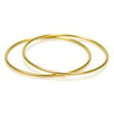 Gold Plated Thin Plain Bangles stacked on a white background, showcasing their sleek and minimalist design.