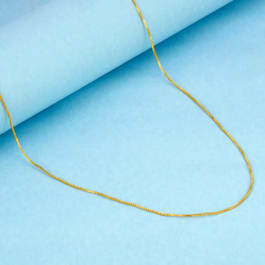 Very Nice Designer Ladies Kilukkam Box Chain on a light blue background, showcasing its gold plated design.