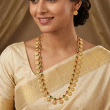 Traditional Antique Lakshmi Kasu Kemp Long Chain Set worn by a model with golden coins and colorful stones.