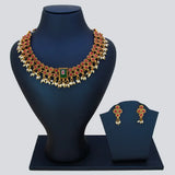 Antique White Pearls Hanging Stone Necklace Set featuring ornate gold detailing and matching earrings on a display bust.