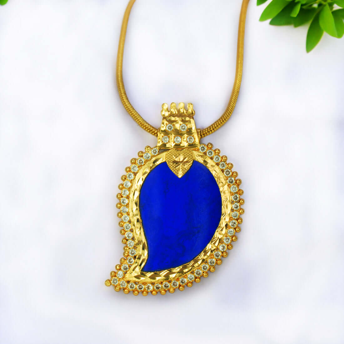 Classic Premium Gold Plated CZ Blue Mango Pendant on a chain, showcasing blue mango design with cubic zirconia embellishments.