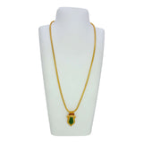 Trendy Gold Plated Small Nagapadam Pendant Necklace displayed on a white bust with green enamel and ruby accents.