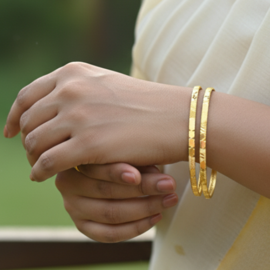 Contemporary Gold Plated Designer Cutting Bangles
