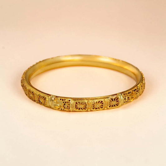 Elegant Gold-Plated Designer Bangle for Women shown on a neutral background.