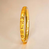 Elegant Gold-Plated Designer Bangle for Women showcasing intricate detailing and a chic design.