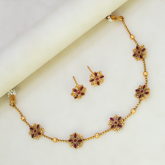 Floral Kemp Stone Antique Gold Choker Necklace Set with ruby-red marquise flower motifs and matching earrings.