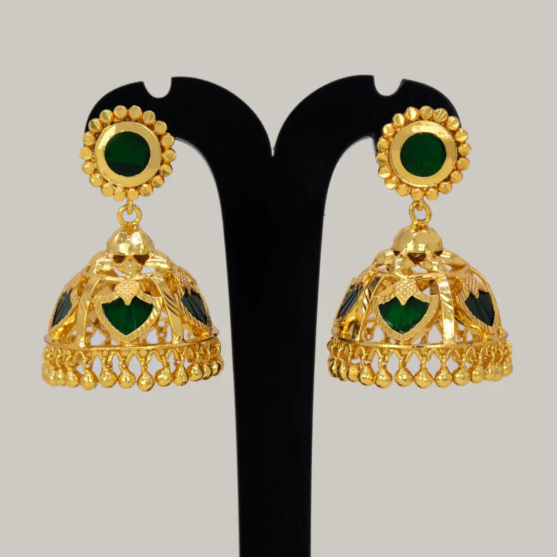 Green Palakka Jhumka Earrings featuring gold-tone design and deep green stones, perfect for festive occasions.