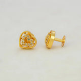 Gold Heart Design Stone Stud Earrings showcasing intricate heart shape with sparkling stones and gold finish.