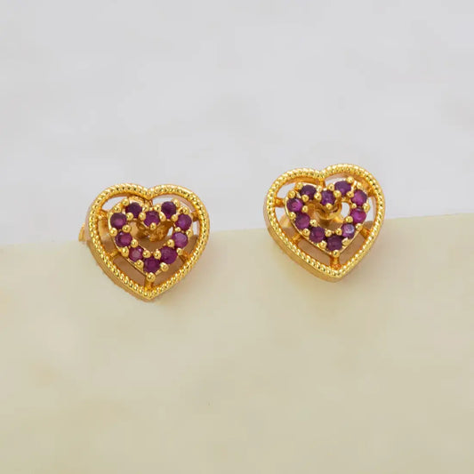 Gold Heart Design Stone Stud Earrings featuring ruby stones in intricate heart shapes with a premium gold finish.