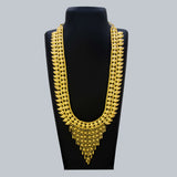 Elegant Gold Plated Bridal Mango Long Necklace displayed on a black stand, showcasing intricate gold plating and mango motifs.