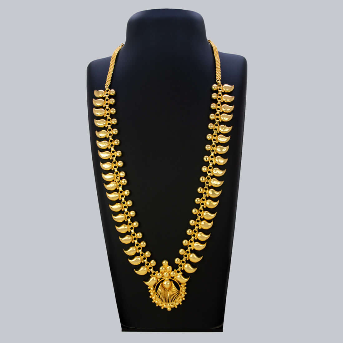 Traditional Gold Plated Bridal Mango Long Chain Haram showcased on a display stand, perfect for bridal occasions.