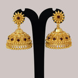 Red Stone Gold Plated Big Jhumka Earrings featuring golden arch mounts and deep red stones.