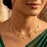 Gold-plated necklace with small White pendants