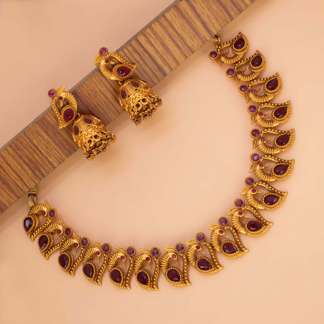 Matte Gold Plated Ruby Stone Peacock Necklace With Jhumka - K Supreme